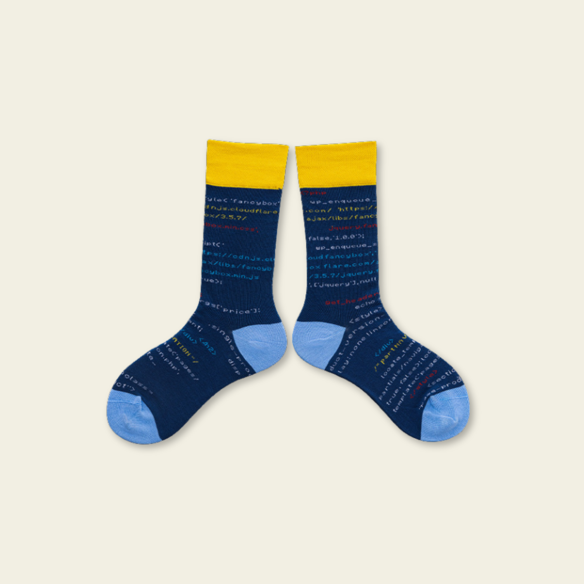 Pair of blue socks with yellow accents on a beige background