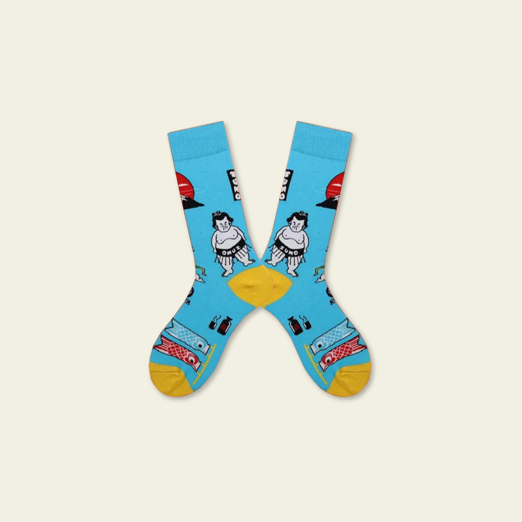 Pair of blue socks with cartoon designs on a beige background