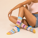 girl with holiday mode socks 