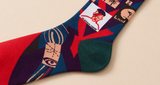 Colorful sock with abstract design on a beige background